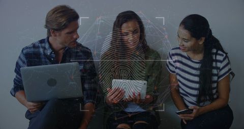 Team Collaborating with Technology and Digital Security Interface