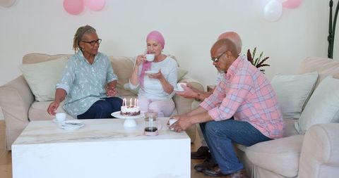 Celebrating Birthday with Cake and Coffee in Relaxed Setting