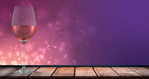 Glass of Rose Wine with Sparkling Background