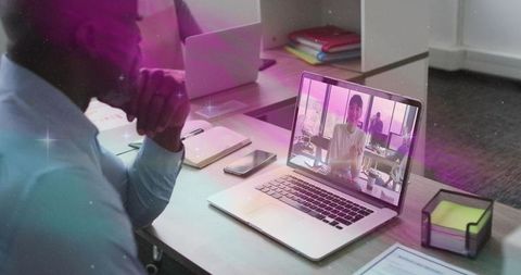 Virtual Meeting with Colleagues in Modern Office Environment