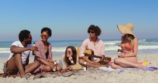 Friends Enjoying Beach Day with Drinks and Music - Download Free Stock Images Pikwizard.com