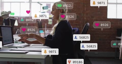 Woman Managing Social Media Notifications in Modern Office Environment - Download Free Stock Images Pikwizard.com