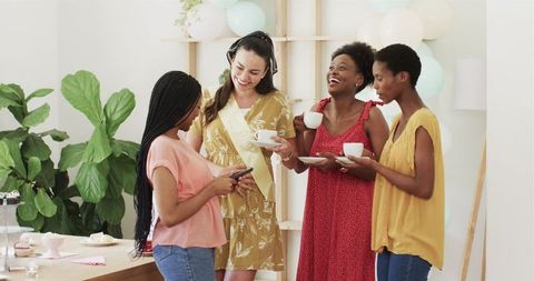 Diverse Female Friends Celebrating and Taking a Selfie Together