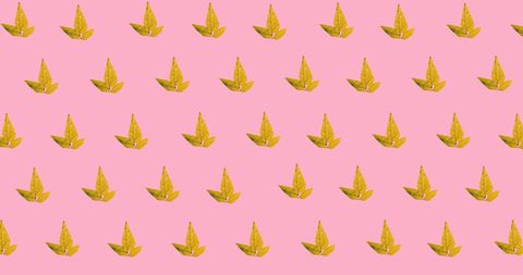 Seamless autumn maple leaves pattern on pink background