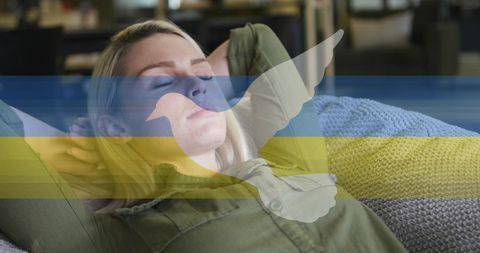 Caucasian Woman Relaxing at Home with Ukrainian Pride
