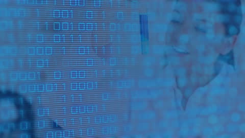 Digital Binary Code Overlaying Woman Scientist in Laboratory