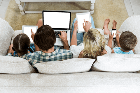 Family Enjoying Technology Together in Comfortable Living Room Setting - Download Free Stock Videos Pikwizard.com