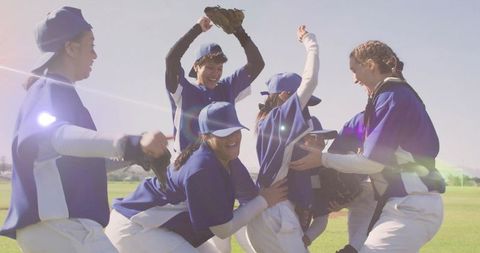 Joyful Baseball Team Celebrating Victory on Field