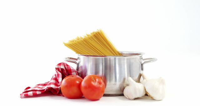 Ingredients for an Italian pasta dish are arranged on a white background. - Download Free Stock Photos Pikwizard.com