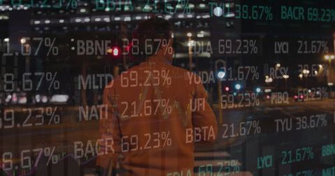 Businessman Analyzing Market Data on Smartphone at Night