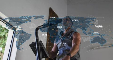 Man exercising on home bike with smartwatch and headphones featuring global hud overlay