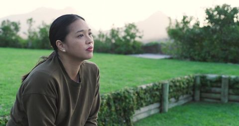 Tranquil Woman Enjoying Outdoor Greenery