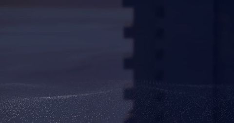 Futuristic digital landscape with particle field and monolith