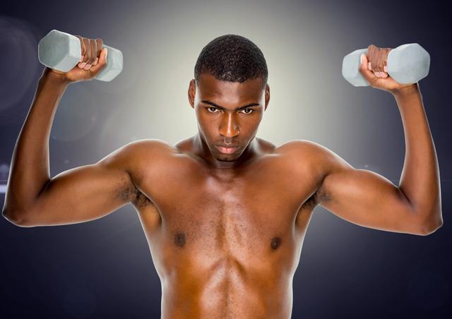 Close-up of fit man exercising with dumbbells 