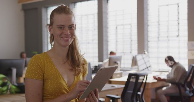 Confident Woman Using Tablet in Modern Bright Office - Download Free Stock Images Pikwizard.com