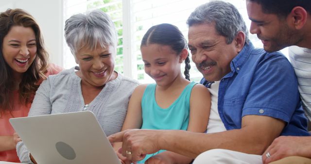 Multigenerational Family Enjoying Time Together Using Laptop at Home - Download Free Stock Images Pikwizard.com