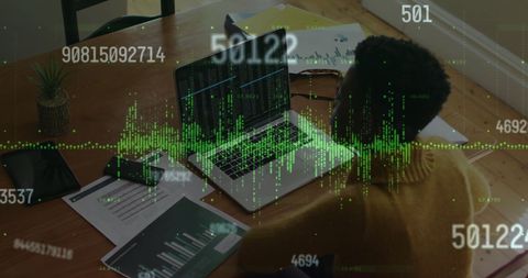 Entrepreneur Analyzing Financial Data on Laptop in Modern Office - Download Free Stock Images Pikwizard.com