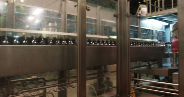 Automated Bottling Line in Modern Factory - Download Free Stock Images Pikwizard.com