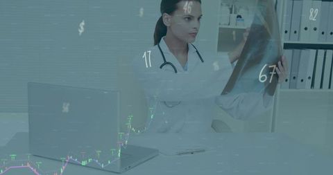 Doctor Analyzing X-Ray With Digital Data Overlays in Clinic