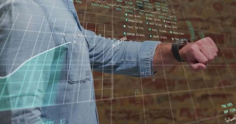 businessman tracking stock market data on smartwatch and digital tablet - Download Free Stock Images Pikwizard.com