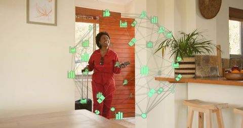 Entering woman holding phone and suitcase in sunlit home displaying augmented data overlay
