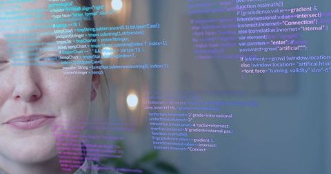 Software developer analyzing code through translucent screen