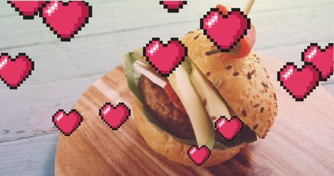 Pixel Hearts Adorn Tasty Burger on Wooden Board - Download Free Stock Images Pikwizard.com