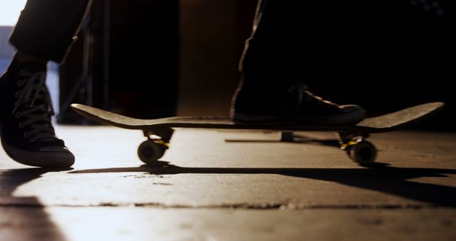 Silhouette of Skateboarder Balancing on Skateboard - Download Free Stock Images Pikwizard.com