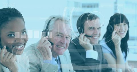 Diverse business team communicating via headsets in futuristic setting