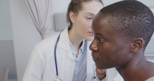 Female Doctor Conducting Health Examination for Young Patient - Download Free Stock Images Pikwizard.com