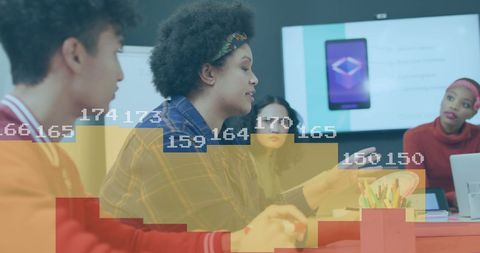 Diverse Professionals Analyzing Data at Modern Office Meeting