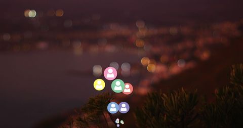 Social Media Overlay Against Coastal Nightscape Background