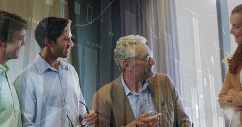 Diverse colleagues discussing with statistical data overlay