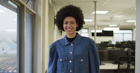 Creative businesswoman smiling confident in office