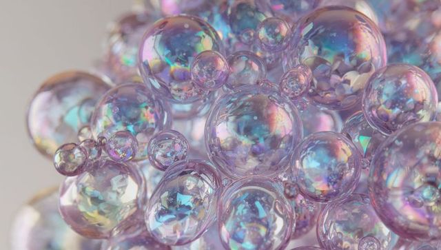 Macro soap bubble cluster reflecting pastel iridescence with glossy translucent spheres