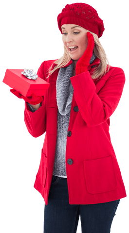 Festive Woman in Red Holding Gift Box with Surprise Expression