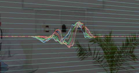 Doctor Analyzing Medical Waveform in Clinical Setting