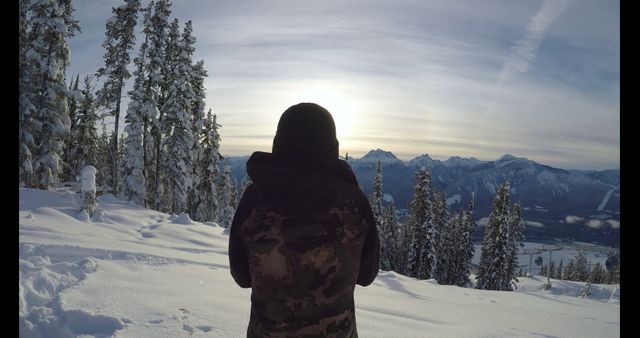 Person Enjoying Morning Views on Snowy Mountain Top - Download Free Stock Images Pikwizard.com