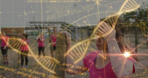 Female athlete leading outdoor group training with dna data overlay, fitness science