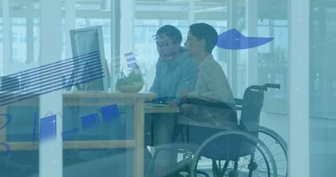 Business Professionals Analyzing Data at Workplace in Modern Office