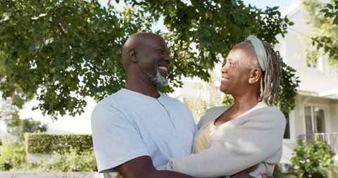 Happy Senior African American Couple Embracing in Garden Setting - Download Free Stock Images Pikwizard.com