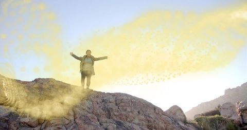Woman Hiker Embracing Wilderness with Golden Swirl Around