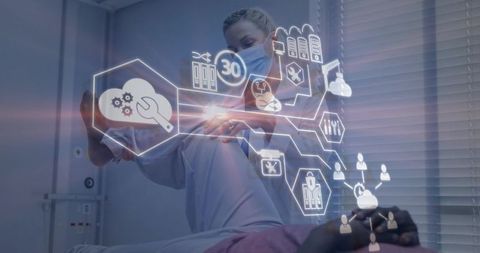 Clinician supporting patient leg with augmented reality therapy interface in clinic
