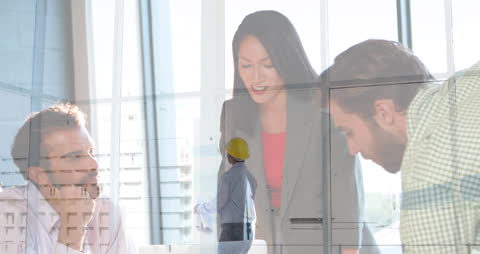 Team Collaborating with Digital Interface in Modern Office