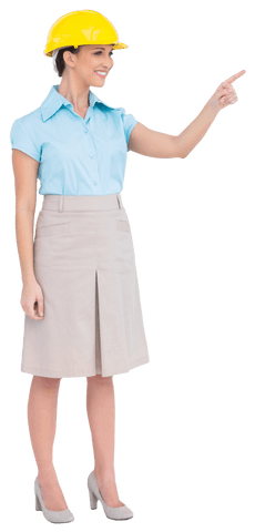 smiling engineer woman pointing with safety helmet on transparent background - Download Free Stock Videos Pikwizard.com