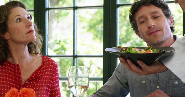 Couple Awaiting Meal Presentation in Upscale Restaurant - Download Free Stock Images Pikwizard.com