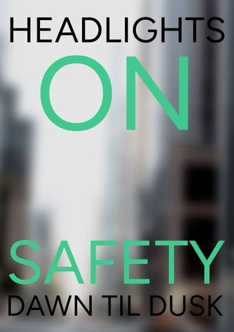 Urban road safety message with green text over cityscape