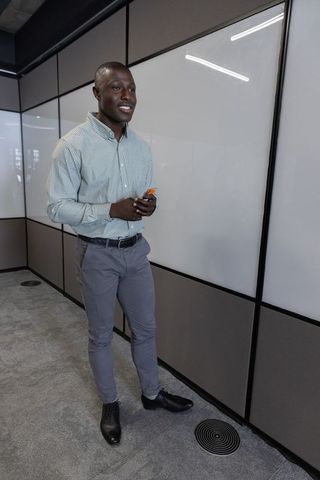 Confident professional leading modern whiteboard presentation