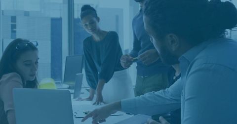 Team Discussion in Modern Glass-Office Layout