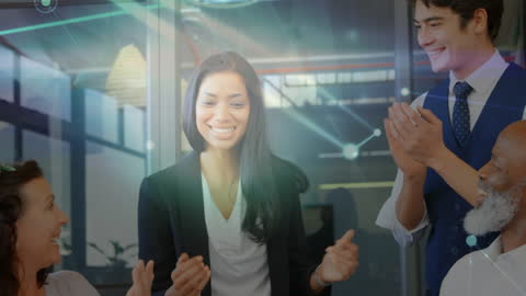 Diverse Team Celebrating Success with Abstract Technology Overlay